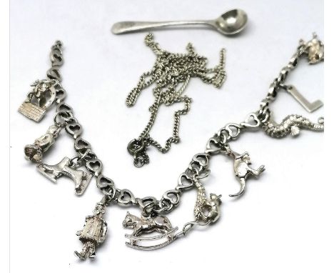 quantity of silver charms on a heart design chain (approx 39g lacking catch) t/w a broken silver chain and salt spoon 