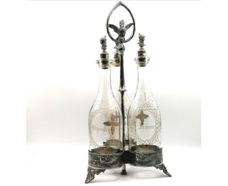 Meriden Brandy / Whisky / Rum decanter set on a plated spirit bottle carrier with a parrot finial to handle - total height 20