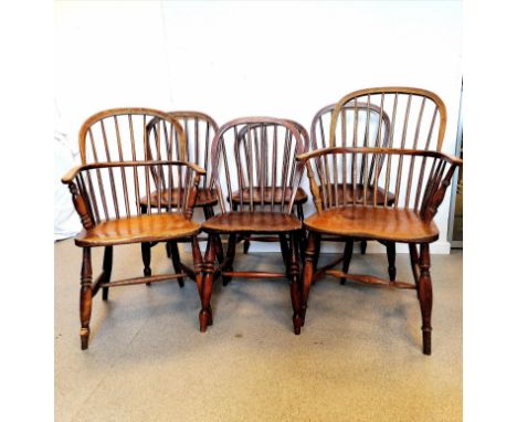 a pair of antique elm Windsor carver chairs t/w 4 matched antique elm farmhouse stick back chairs 