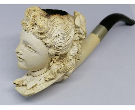 Meerschaum Pipe as a ladies head, in original case that is in 2 pieces. 7" long x 3" high. No cracks but blackening to the to