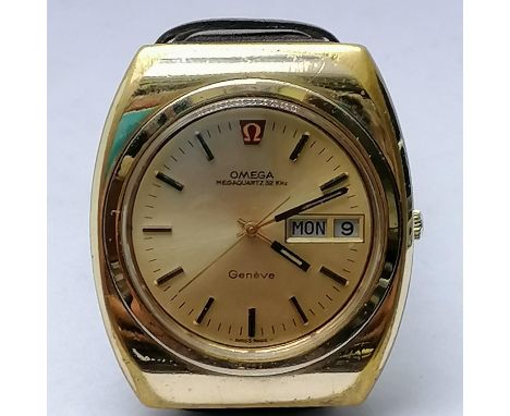 Gents Omega Megaquartz 32KHZ day date vintage gold plated watch on leather strap 