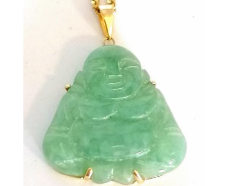 Hardstone carved jade buddha pendant in gold mount on a 9ct gold 24" chain 