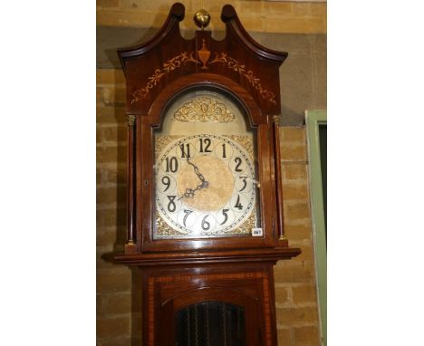 AN EDWARDIAN INLAID MAHOGANY LONGCASE CLOCK, the arched silvered dial with arabic numerals, triple weight movement, glazed tr