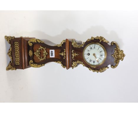 AN EDWARDIAN FRENCH INFLUENCE AND ORMOLU MOUNTED LONGCASE MANTLE CLOCK, white enamel dial with single train platform escapeme
