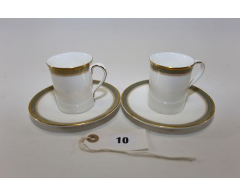 A SET OF TWELVE ROYAL DOULTON "CLARENDON" PATTERN PORCELAIN COFFEE CANS &amp; SAUCERS and a part set of "Roslyn" porcelain DI