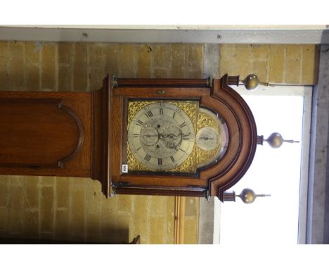 GEORGE SUGGATE, HALESWORTH, A GEORGE III OAK 8 DAY LONGCASE CLOCK the engraved arched brass and silvered dial with strike/sil