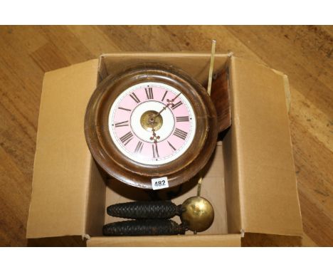 A LATE 19TH CENTURY CIRCULAR POSTMANS ALARM WALL CLOCK, with a pink/white enamel dial.   