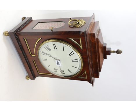 A LATE REGENCY MAHOGANY BRACKET CLOCK, stepped top case with brass centre finial, inset brass mouldings and ball feet, 8 ins 