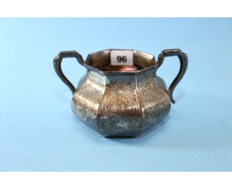 A VICTORIAN SILVER DOUBLE HANDLED SUGAR BASIN of compressed octagonal form with foliate engraved panels, maker:- WKR, London 