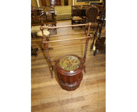 A VICTORIAN MAHOGANY CIRCULAR COMMODE, hinged lid above fluted sides and pull out step, 16 1/2 ins diameter and a ditto mahog