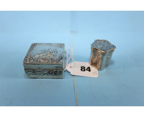 A DUTCH SILVER SQUARE BOX embossed with a romantic couple, stamped 925, date letter K and a smaller Dutch DITTO of shaped out