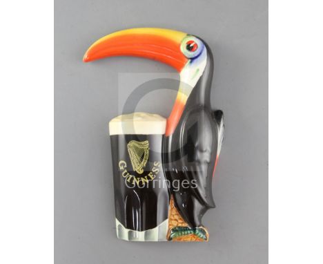 A rare Carltonware Guinness toucan and pint glass wall appliqué, impressed number GA2492, height 7in.