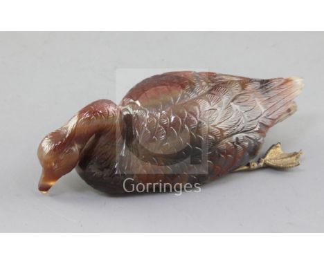 A late 19th / early 20th century carved agate model of a swan, with gilt metal feet, 4in.