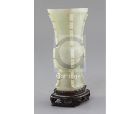 A Chinese archaistic pale celadon jade beaker vase, gu, Qianlong / Jiaqing period (late 18th / early 19th century), of ellipt