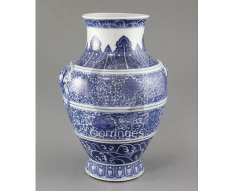 A Chinese blue and white vase, Qianlong seal mark but 19th century, painted in Ming style with bands of lotus flowers amid sc