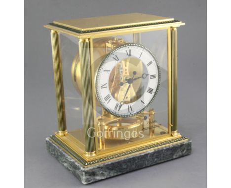 A Jaeger le Coultre 'Vendome' model Atmos timepiece, of characteristic four glass design, with fluted corner columns, raised 