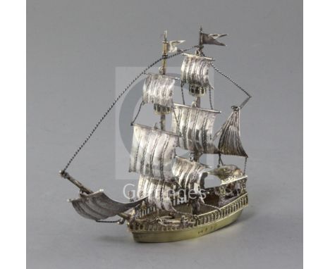 A late 19th/early century Hanau silver gilt model of a Brig, with Berthold Hermann Muller import marks, height 13.9cm.
