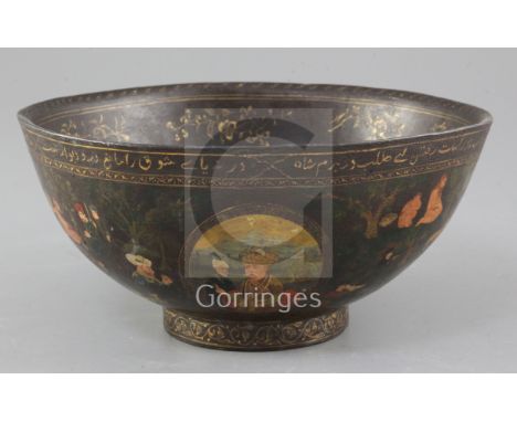 A Persian painted papier mache bowl, 19th century, the exterior painted with scenes of hunting, royalty and dignitaries, the 