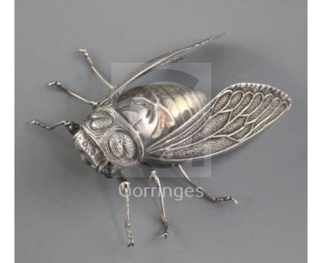 A Japanese silver articulated model of a cicada, by Muneyoshi, Meiji period, the insect with fully articulated legs and wings