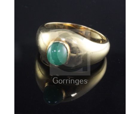 An 18ct gold and cabochon jade ring, size V.