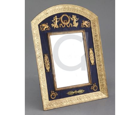 A 19th century French Empire ormolu mounted easel frame toilet mirror, the frame cast with palmettes and foliate scrolls, hei