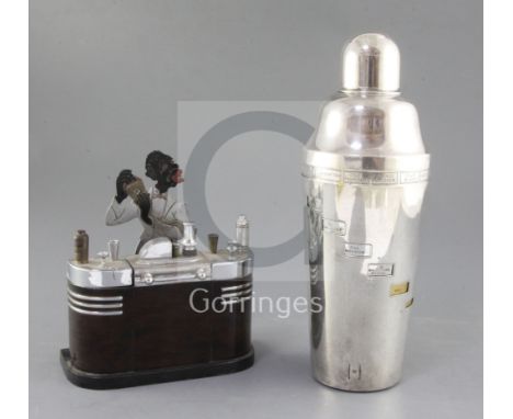 A 1930's Ronson 'Bartender' lighter, the central lighter flanked by two compartments with hinged tops for cigarettes, with at