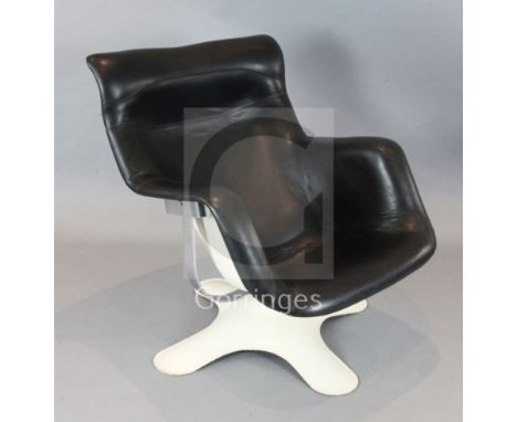 A vintage Karuselli black leather lounge chair, designed by Yrjo Kukkapuro, with cream enamelled underframe, with original Ha