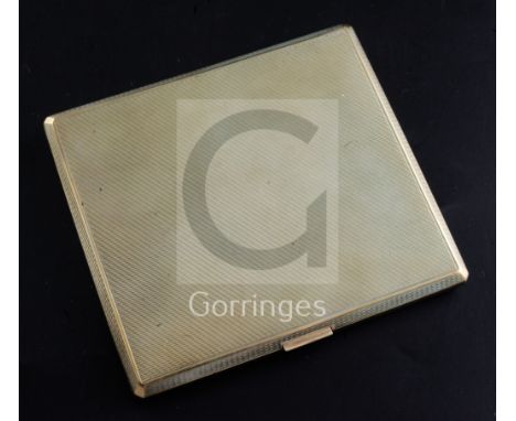 A 1930's engine turned 9ct gold cigarette case, S.J Rose & Son, London, 1939, 93mm.