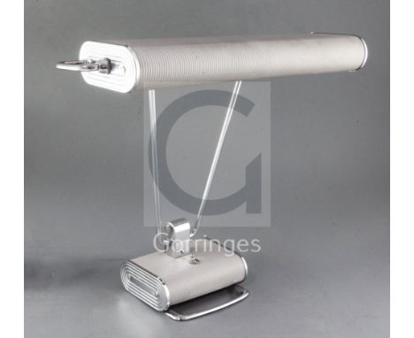 An Eileen Gray chromed metal and grey phenolic desk lamp, width 17.5in. height 15in.