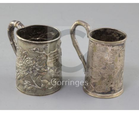 A late 19th/early 20th century Chinese Export repousse silver christening mug by Wang Hing, Hong Kong, and one other Chinese 