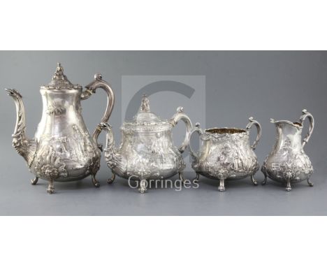 A good Victorian Elkington & Co silver four piece tea and coffee service, of pear form and embossed and chased with figures i