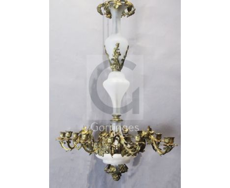 A 19th century French gilt metal and opaque glass twelve light chandelier, decorated with vineous motifs, drop 3ft 1in. diame