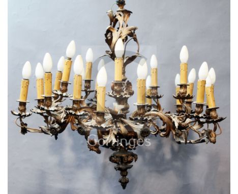 A 19th century ormolu five branch chandelier, formed of acanthus scrolls interspersed with flowers, each arm with four lights