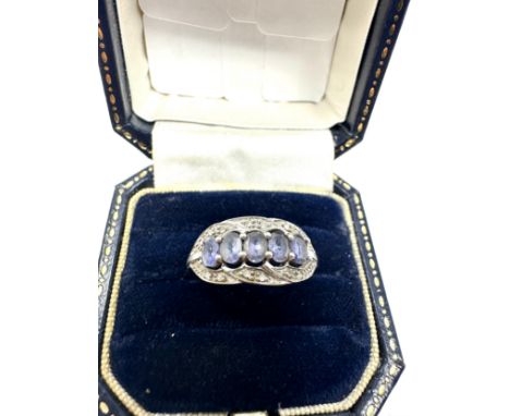 9ct white gold tanzanite five stone ring with diamond surround (2.2g) 