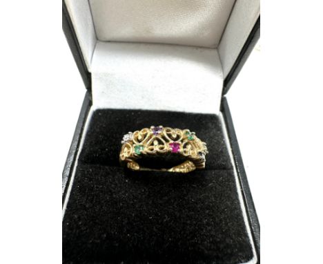 C.O.A 9ct gold diamond ruby sapphire emerald &amp; topaz the dearest ring 