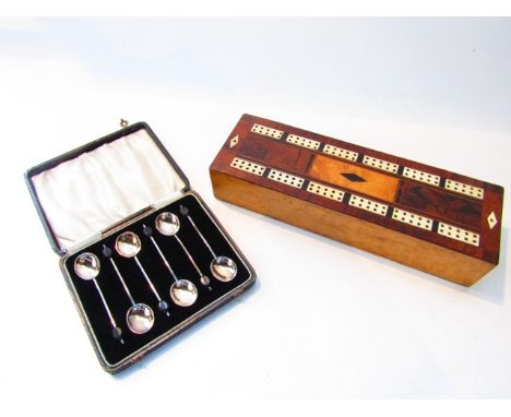A cased set of six silver spoons, Birmingham, 1933, each with coffee bean terminal, 39.8g in total; and a 19th century cribba