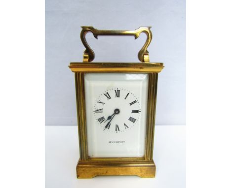 A brass carriage clock with enamel dial and 8 day time piece, Jean Renet