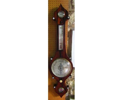 A mid-19th century rosewood wheel  barometer with silvered dials, the case work with mother of pearl inlay detail