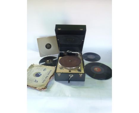 A Decca cased table top gramophone together with a selection of records to include Kishmul's Gallery, Abide with Me, etc