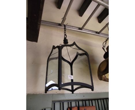 A contemporary reproduction of gothic style hanging ceiling lantern of square cut form with lancet shaped glazed panels 