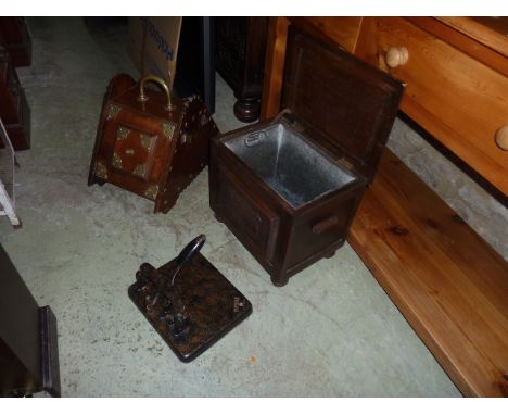 A late Victorian walnut coal scuttle with applied brass fittings, a small oak coal box with hinged lid over a fielded panel a