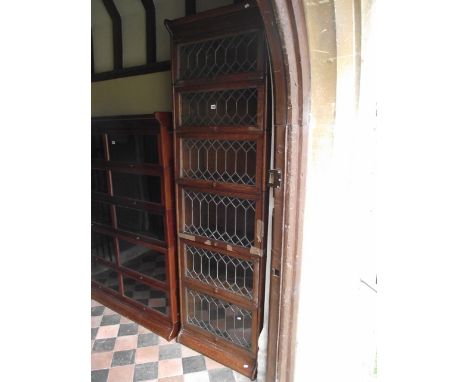 A Globe Wernicke style floor standing six sectional library bookcase enclosed by rectangular leaded light glazed up and over 