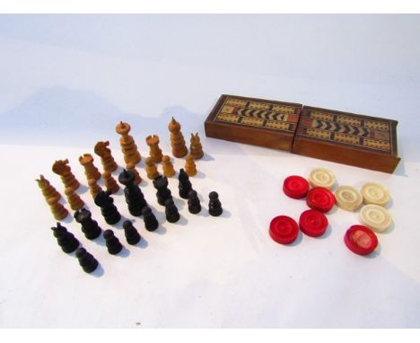 An antique turned timber chess set, 16 pieces in fruitwood, 13 in ebony together with a small cribbage box (AF), containing 9