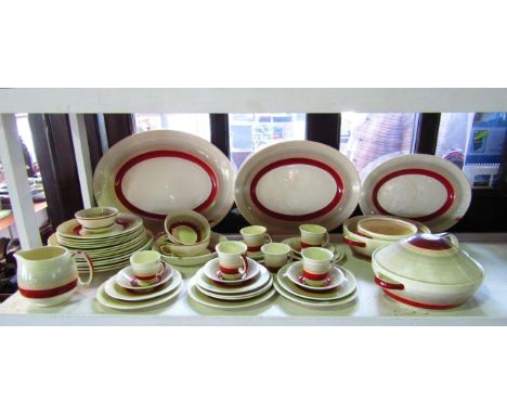 A quantity of Susie Cooper dinner and coffee wares with graduated grey and rust banded decoration, comprising: three oval gra