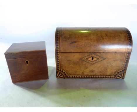 A good quality 19th century dome shaped tea caddy, the exterior profusely decorated with an inlay of mixed timbers to include