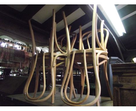 A set of six light beechwood Bentwood café chairs with circular seats (further sets available throughout the auction)