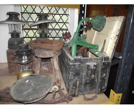 A vintage stained pine tool chest with hinged lid enclosing various vintage woodworkers and plumbers hand tools, together wit