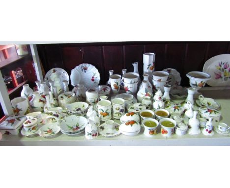 An extensive collection of Royal Worcester Arden and Evesham pattern wares including numerous vases, candle sticks, covered b