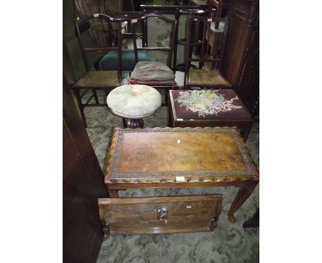A Victorian walnut piano stool with circular button upholstered revolving adjustable seat, raised on a partially turned pilla