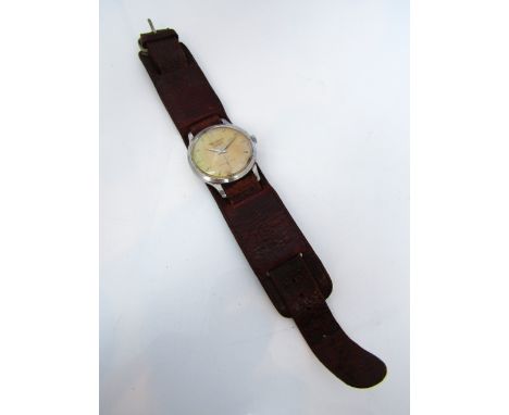 A gentleman's stainless steel wristwatch, Jaeger LeCoultre automatic, retailed by Tarratts, the circular champagne dial with 